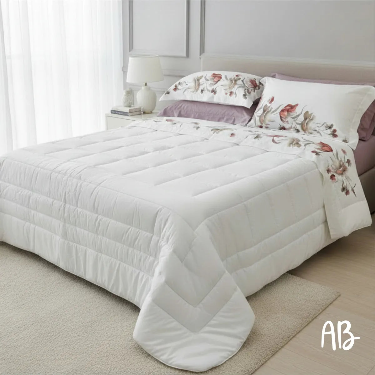 Trapunta in raso di cotone Blumarine Lory con focus sullo swarovski